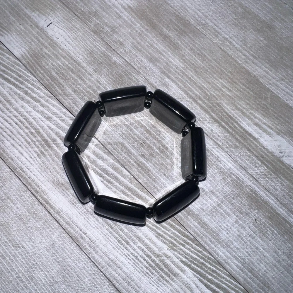 4 black bracelets